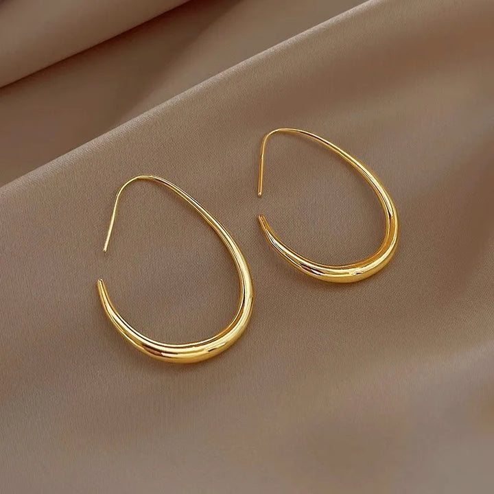 Oval hoop earrings in 925 silver and 14k gold plated