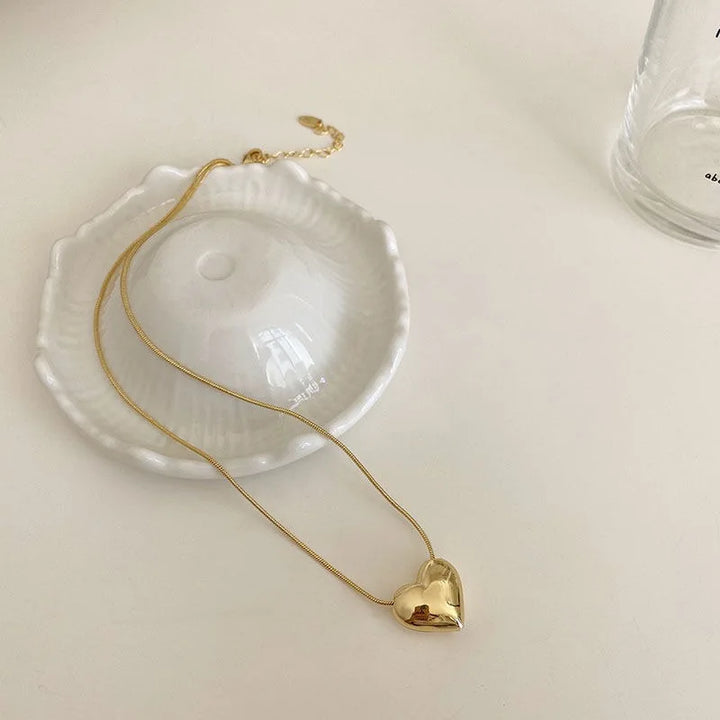 18k gold plated cord with heart pendant