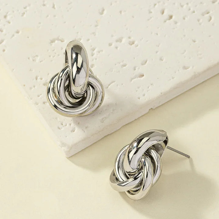 Silver and gold knot hoop earring