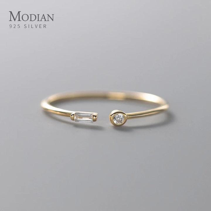 Adjustable ring plated in 14k gold and 925 sterling silver adorned with zirconia