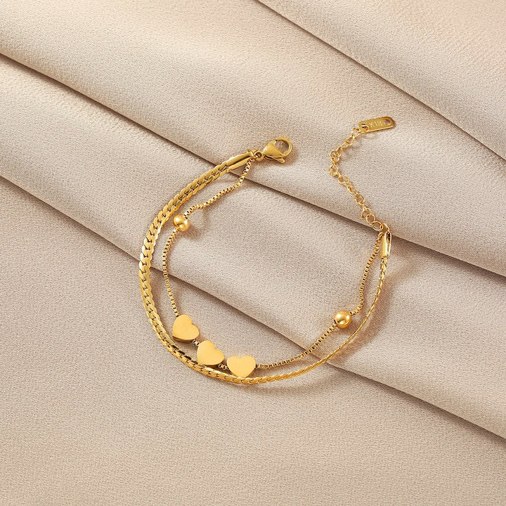 Heart pendant stainless steel bracelet plated in 14k gold