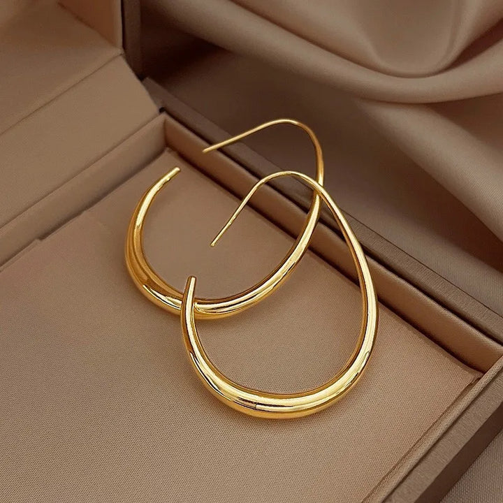 Oval hoop earrings in 925 silver and 14k gold plated