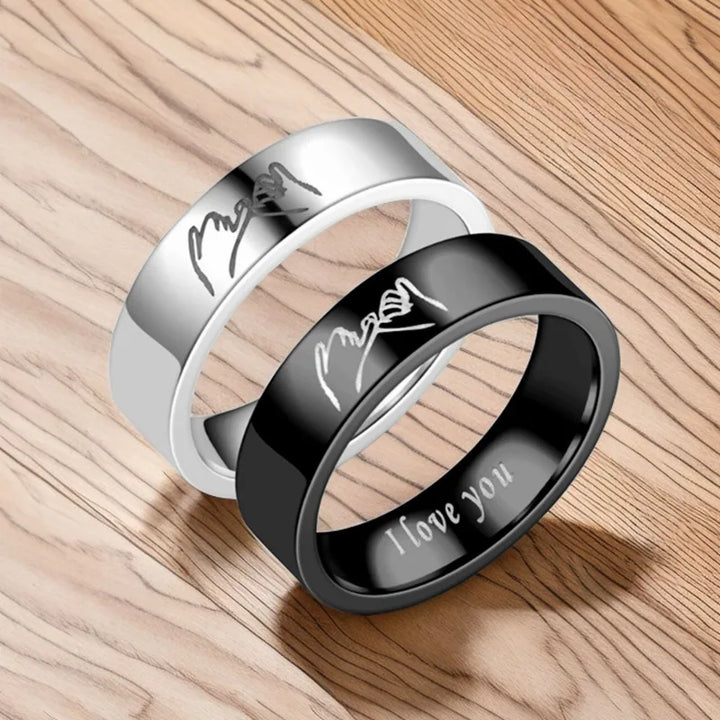 Fashionable And High-end Titanium Steel Ring Jewelry Gift For Couples Engraved With "I Love You" Letters And Hand-In-Hand Patter