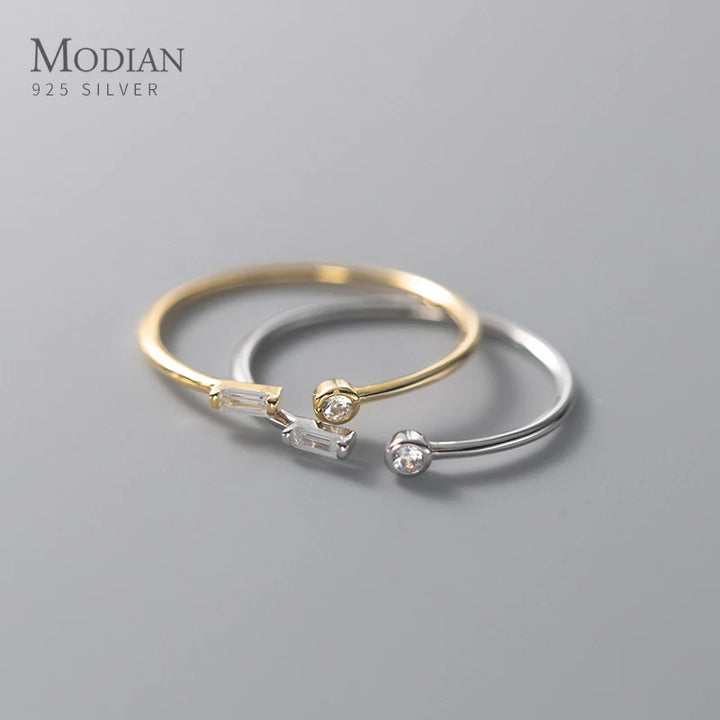 Adjustable ring plated in 14k gold and 925 sterling silver adorned with zirconia