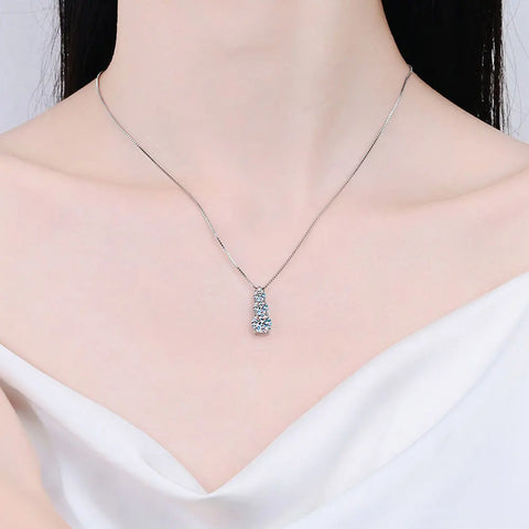 925 sterling silver necklace adorned with tri-stone diamonds/moissanites with original GRA certificate