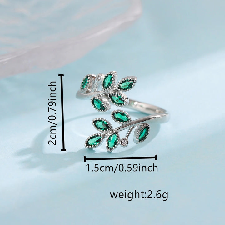 925 Sterling Silver Ring with small emeralds