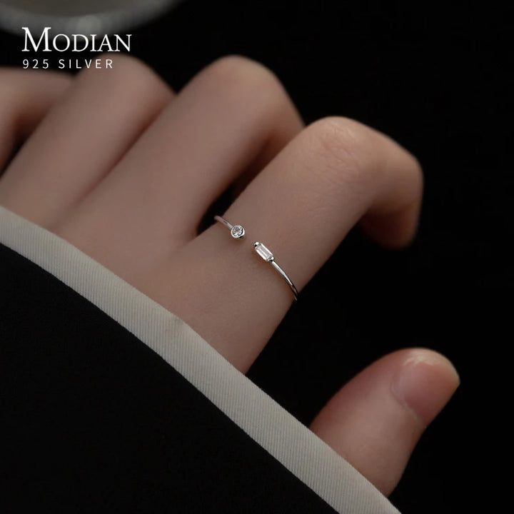 Adjustable ring plated in 14k gold and 925 sterling silver adorned with zirconia