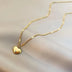 18k gold plated cord with heart pendant