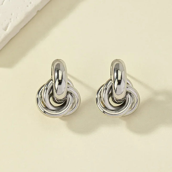 Silver and gold knot hoop earring