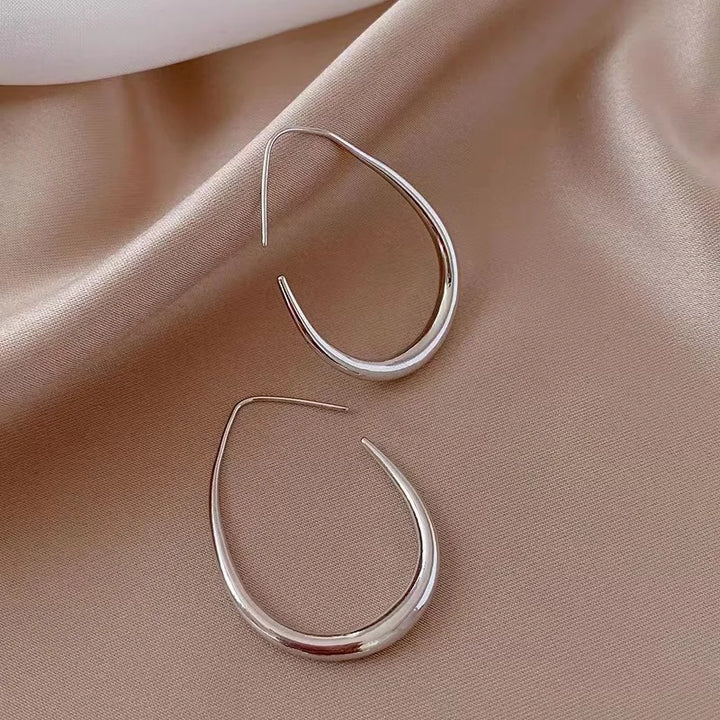 Oval hoop earrings in 925 silver and 14k gold plated